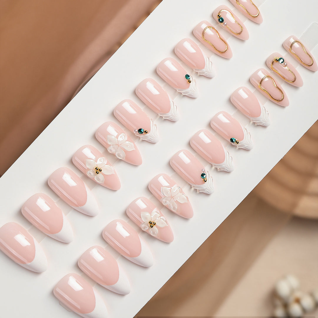 Acrylic nail set with elegant flower and rhinestone decorations Stornfield