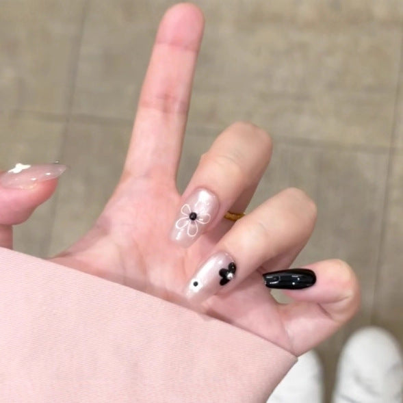 Artistic Press-On Nail Set with Floral and Speckled Design Stornfield