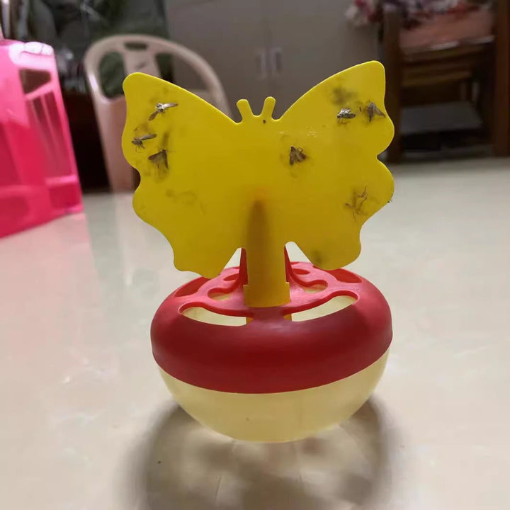 Butterfly-shaped sticky insect trap with refillable liquid reservoir and reusable base Stornfield