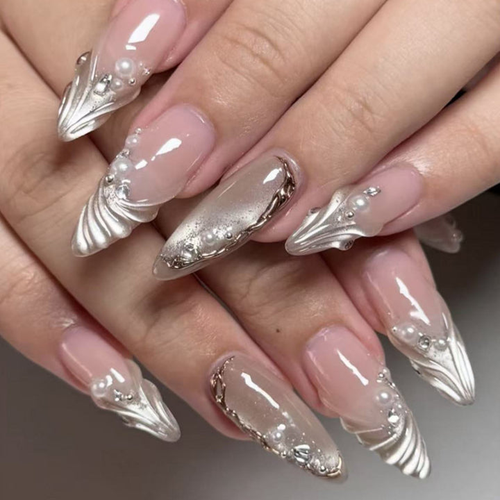 Elegant nail art in maritime design with glitter and 3D accents Stornfield
