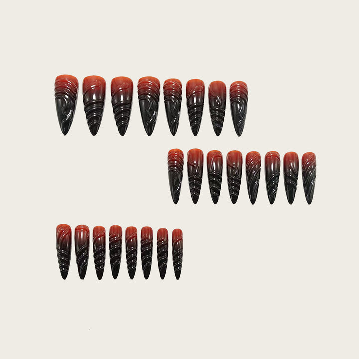 Gothic-style artificial nails with pointed tips and shiny surface Stornfield