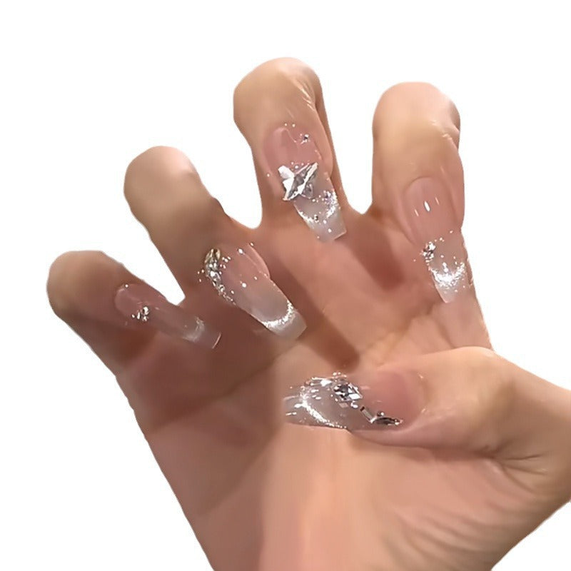 Artistic artificial nails with elegant bow motifs Stornfield