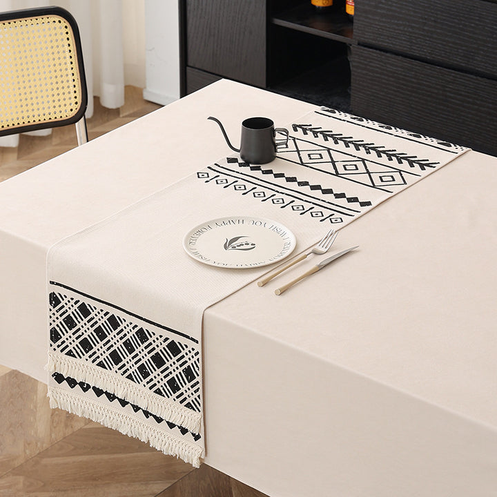 Woven table runner in Boho style with fringes and geometric ethnic print Stornfield