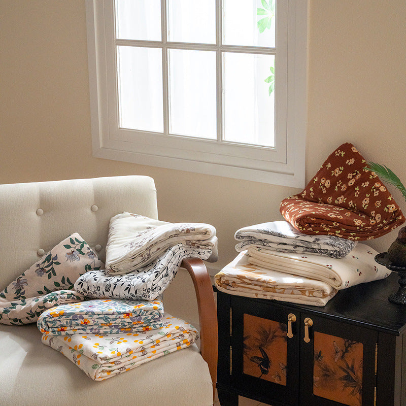 Organic Cotton Muslin Swaddle Blanket with Playful Cartoon Print