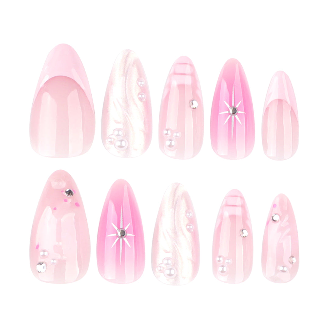 Artful Nail Extensions with Glitter and Shell Motifs Stornfield