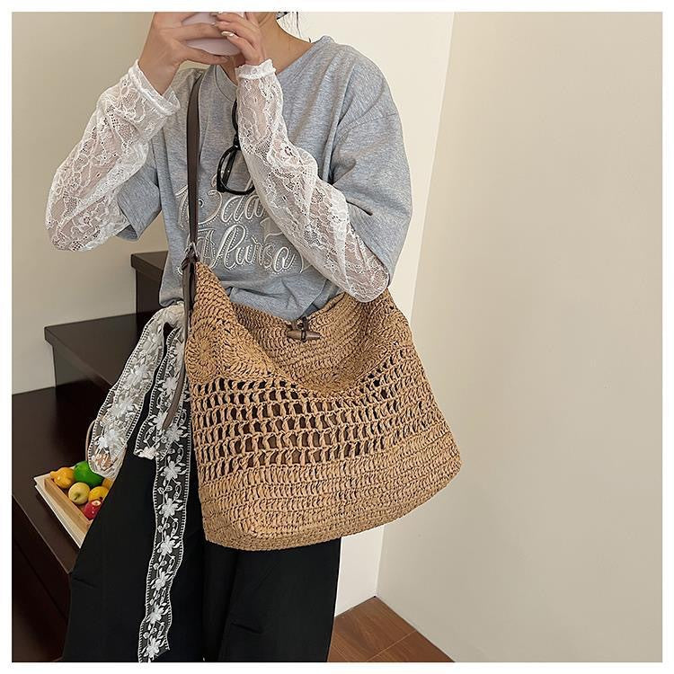 Braided summer handbag with practical leather handles Stornfield