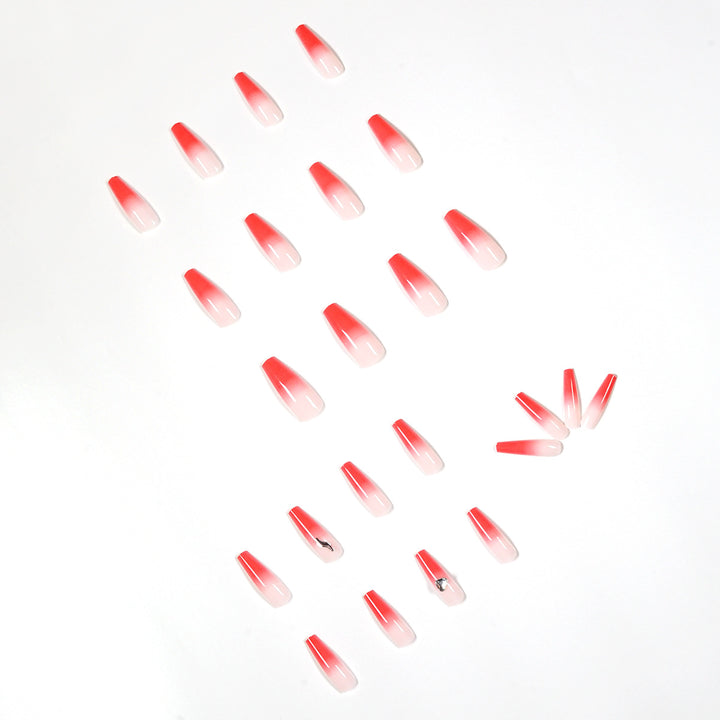 Artful stiletto nails with elegant gradient and rhinestone embellishment Stornfield