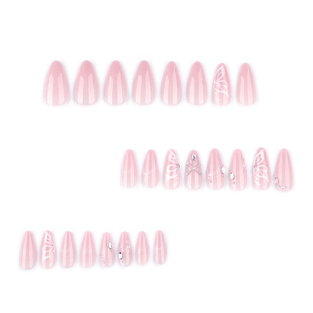 Artful nail extensions with delicate flower and glitter accents Stornfield