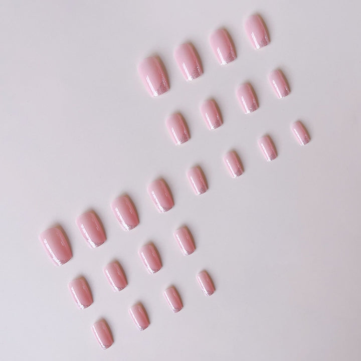 Acrylic nail set with shimmering glitter tips Stornfield