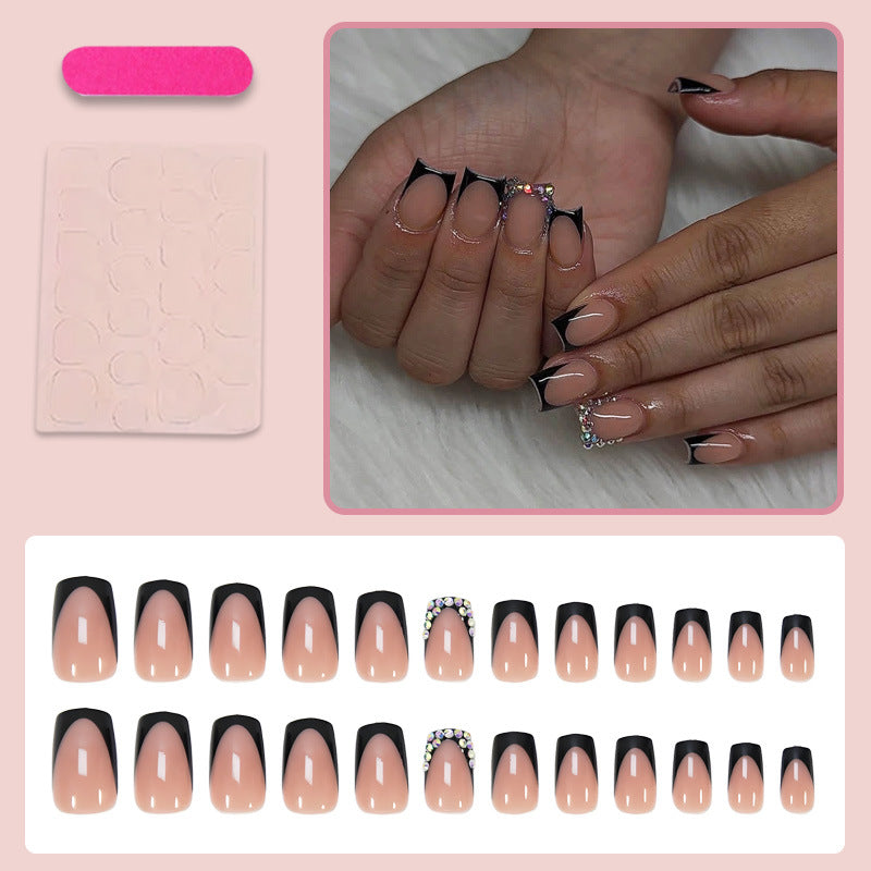 Artificial nail set with elegant black tips and sparkling accents Stornfield