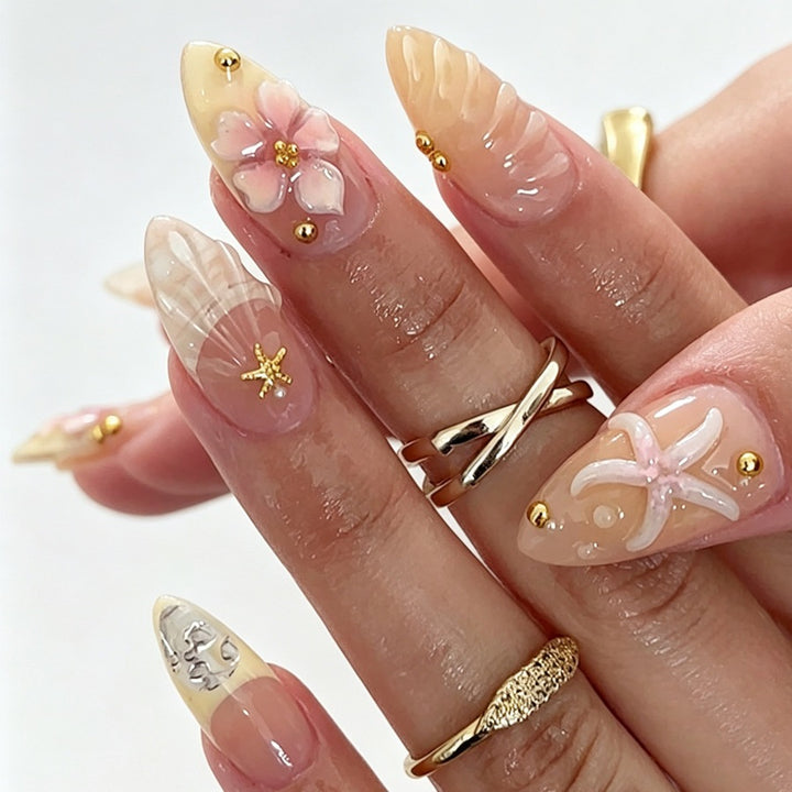 Artificial nail set with floral 3D elements and golden accents Stornfield