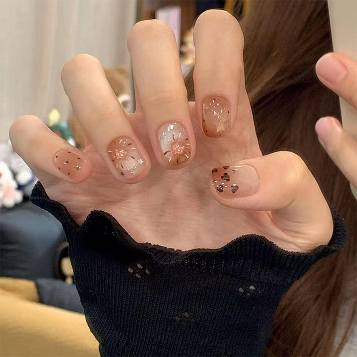 Glamorous artificial nail tips with 3D flower and crystal embellishments Stornfield