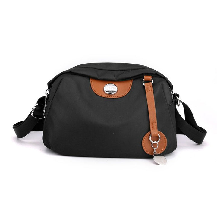 Shoulder bag with adjustable shoulder strap and clear compartment system Stornfield