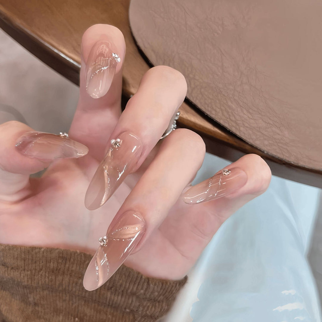 Artificial nails with elegant rhinestone accents Stornfield