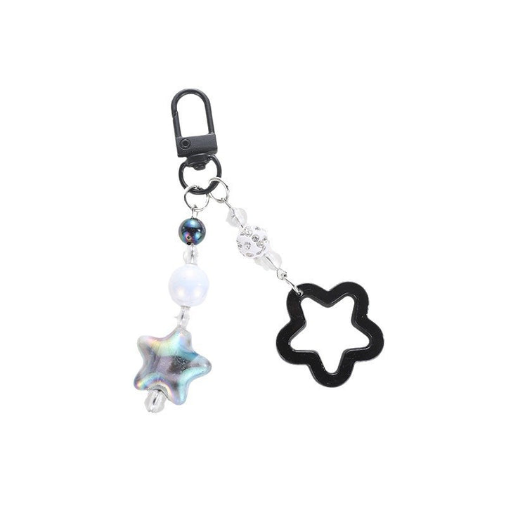 Playful keychain with floral and star motif Stornfield