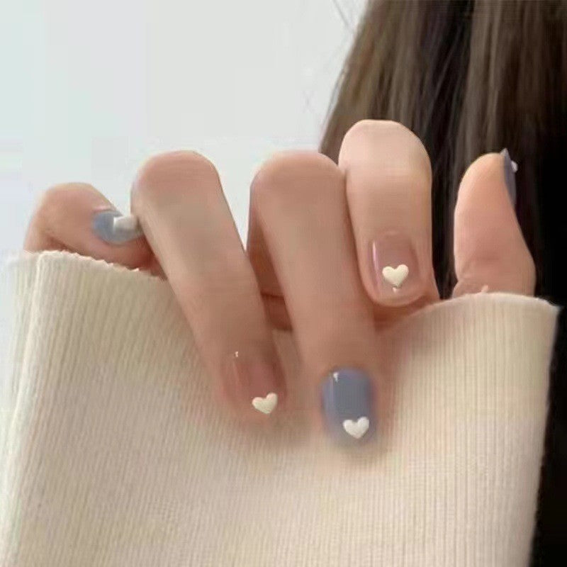 Creative nail art with heart motifs Stornfield