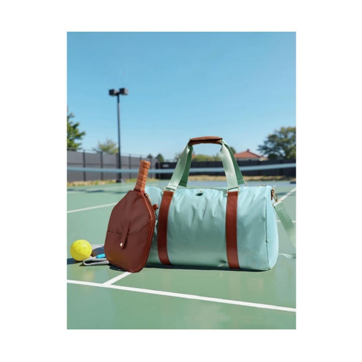 Elegant sports and travel bag with integrated accessory compartment Stornfield