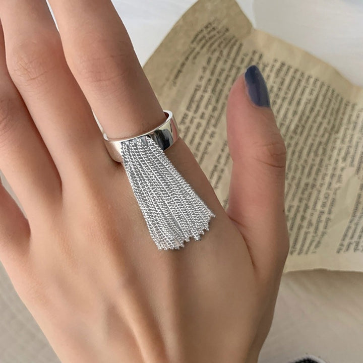 Stylish ring with filigree tassel design Stornfield