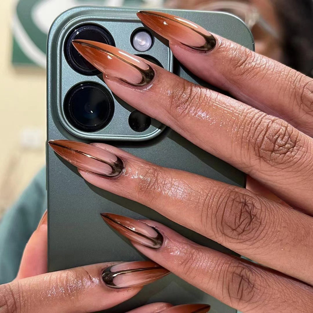 Artistic stiletto nails with trendy ombre effect Stornfield