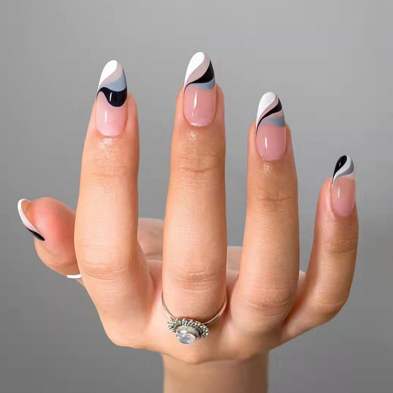Artful nail extensions with creative wave pattern Stornfield