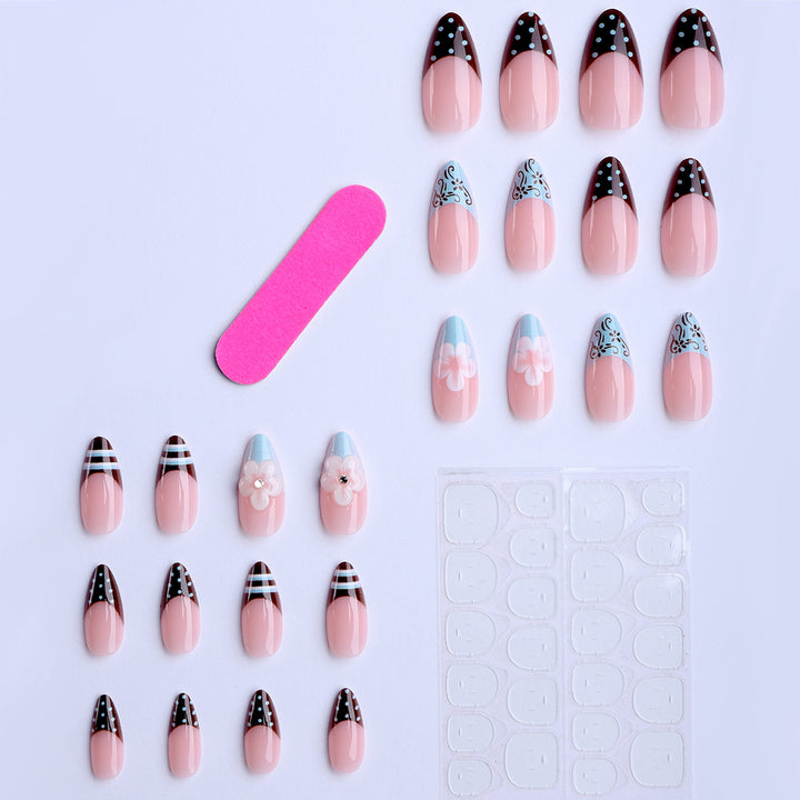Artificial nails with creative floral design and elegant accent colors Stornfield