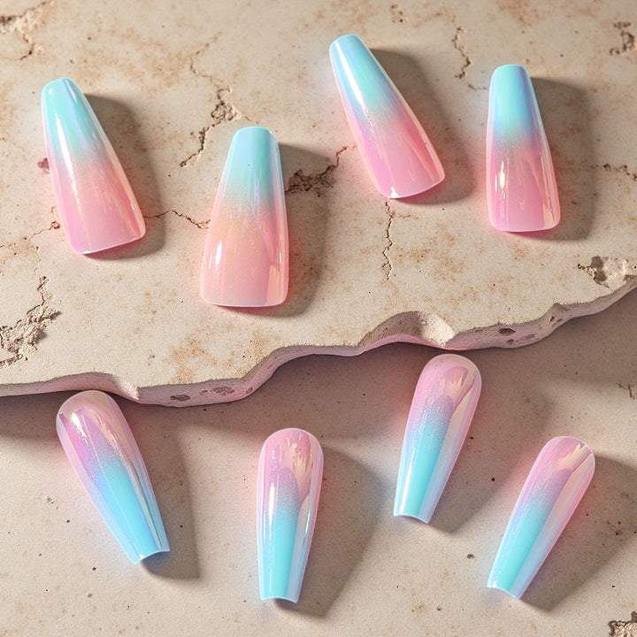 Artificial nails in modern glitter gradient design Stornfield