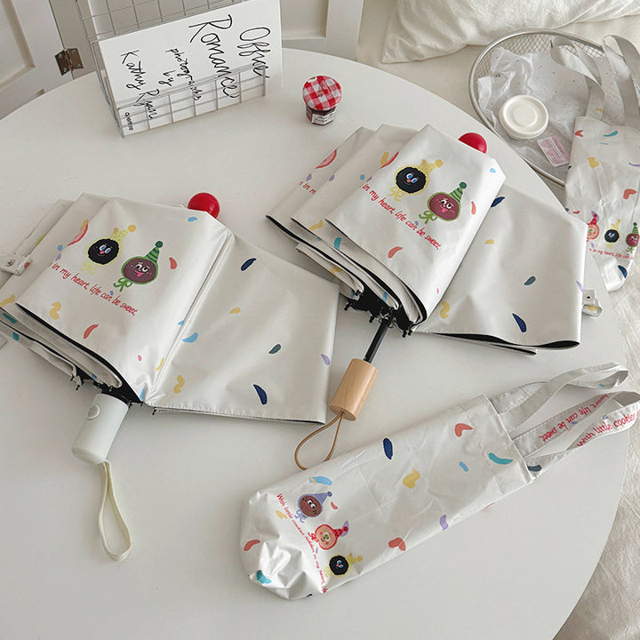 Women Folding Umbrella with Playful Cartoon Designs Stornfield