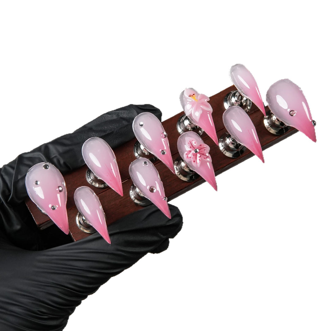 Artistic Stiletto Press-On Nails with Floral and Gem Accents