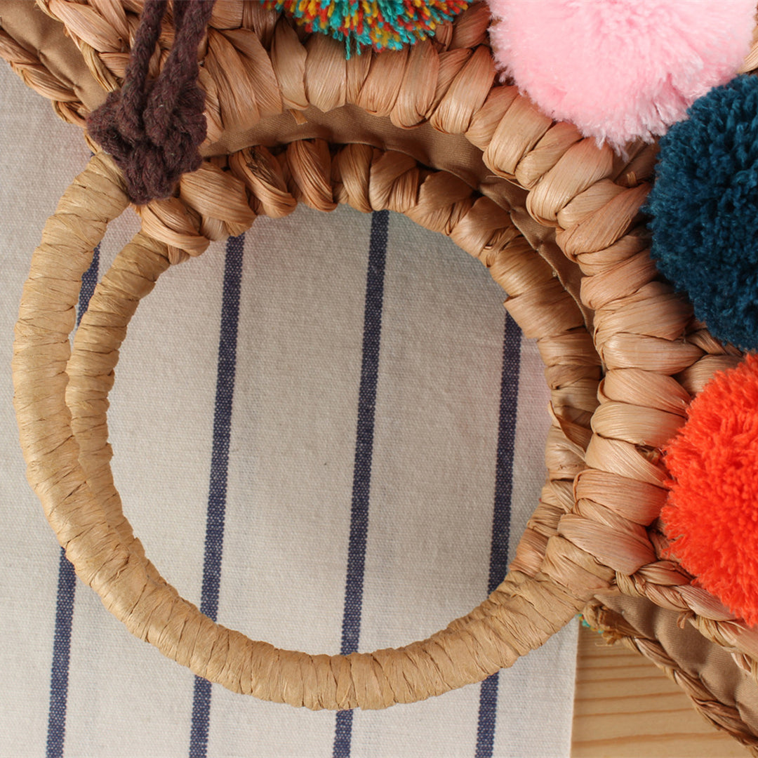 Basket bag with colorful pompons and carrying straps Stornfield