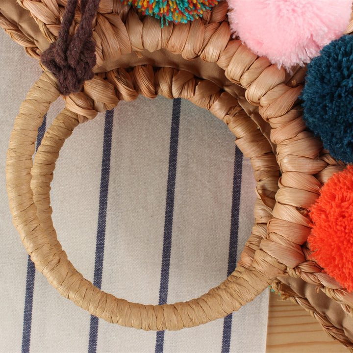 Beach bag with colorful pom poms Stornfield