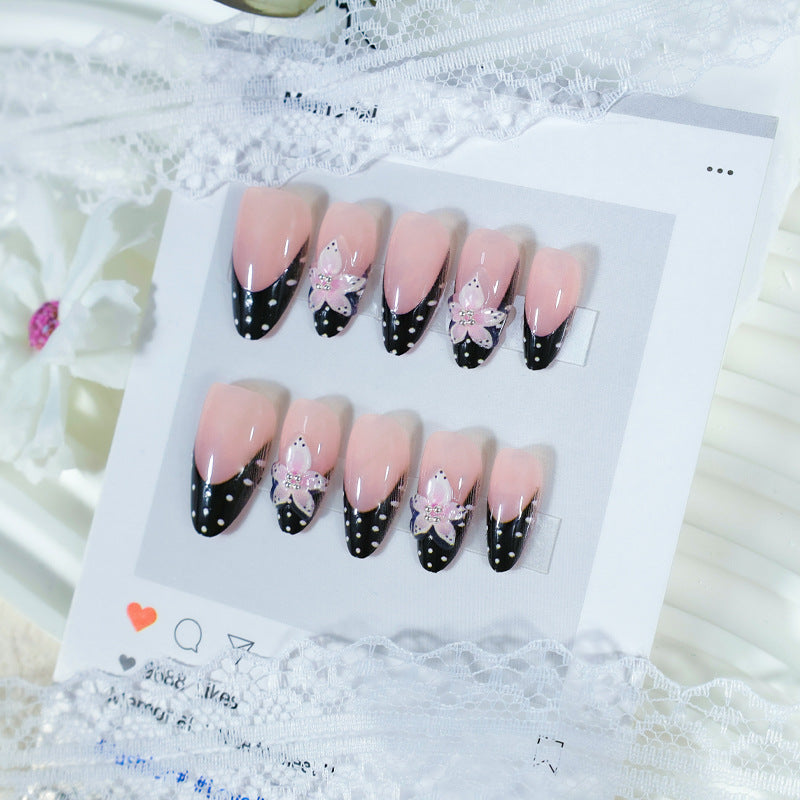 Artificial nail set with elegant 3D flowers and stylish dots Stornfield