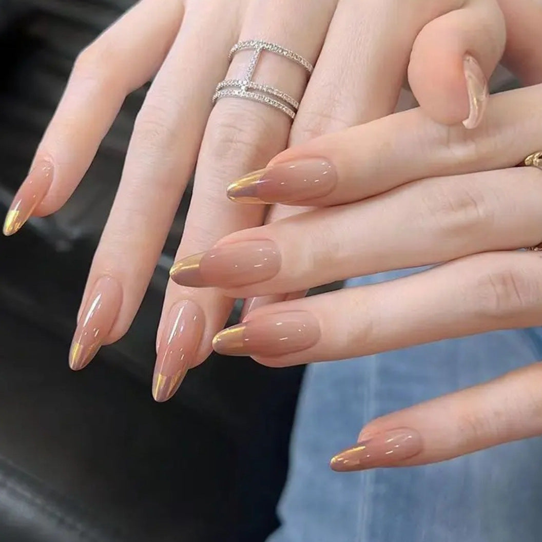 Nail art with elegant gradient and metallic accents Stornfield