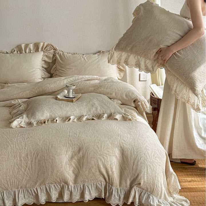 Cotton-linen bedding set with subtle jacquard floral pattern and ruffle trim