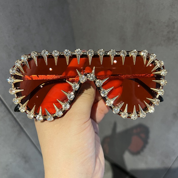 Ladies extravagantly designed cat-eye sunglasses with glitter accents Stornfield