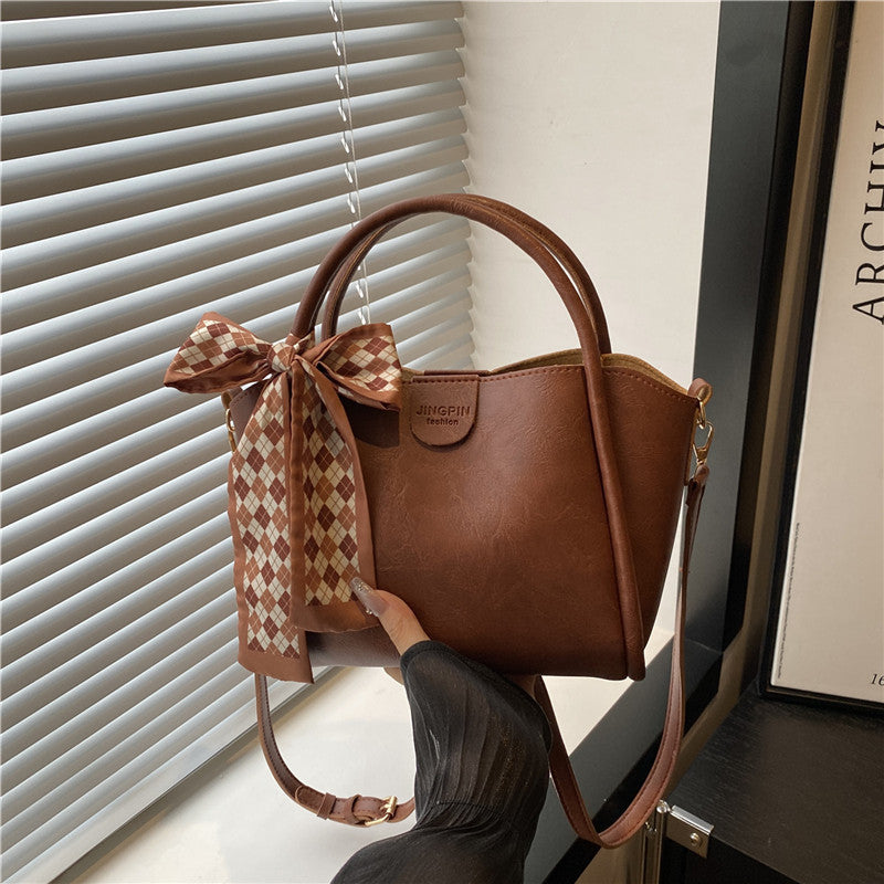 Elegant Bow Accent Handbag Stornfield