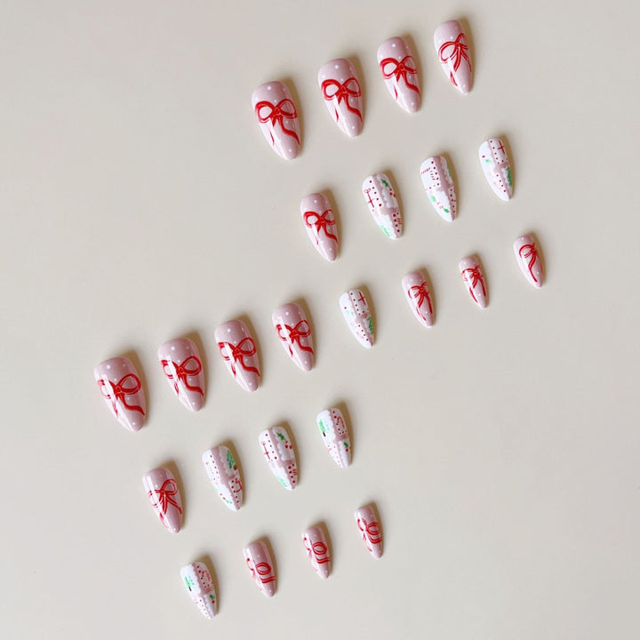 Artificial nail set with festive gift and bow motifs Stornfield