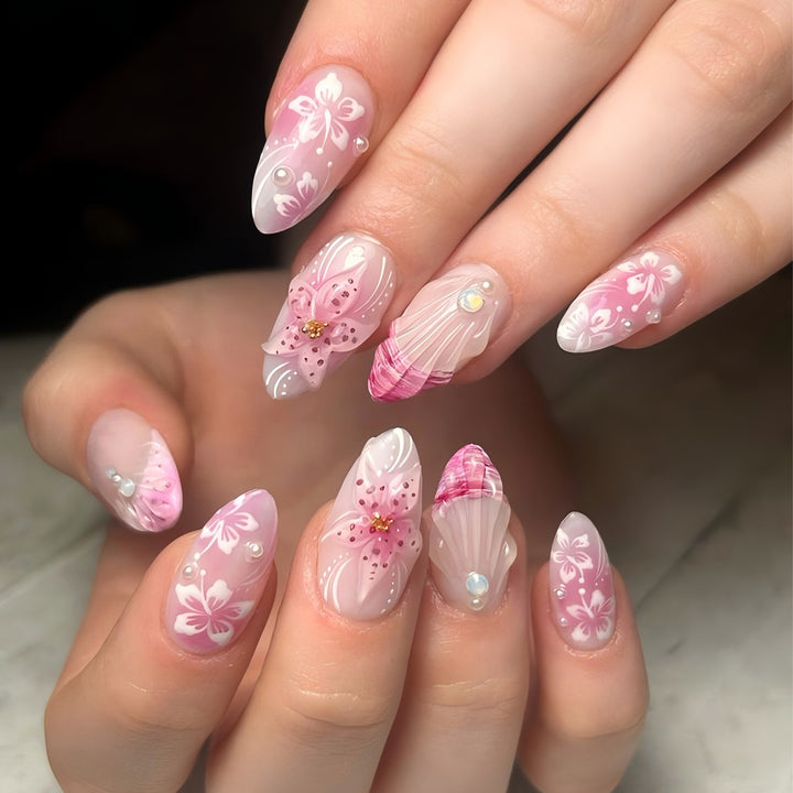 Artful Nail Extensions with Floral and Glittering Accents Stornfield
