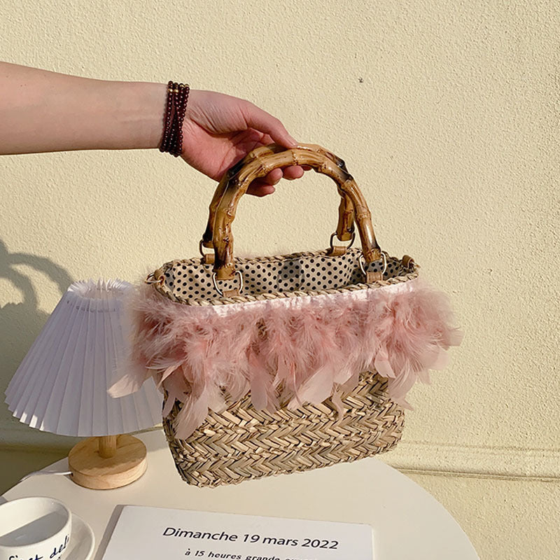 Elegant handbag with feathers and bamboo handles Stornfield