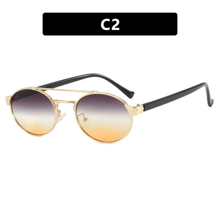 Ladies fashionable sunglasses in stylish round design with golden accents Stornfield