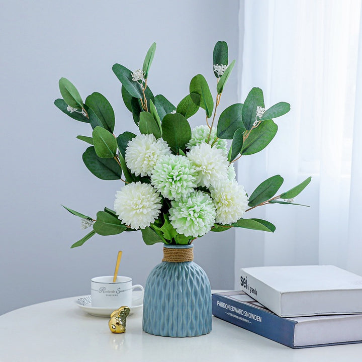 Lifelike Floral Arrangement in Decorative Vase
