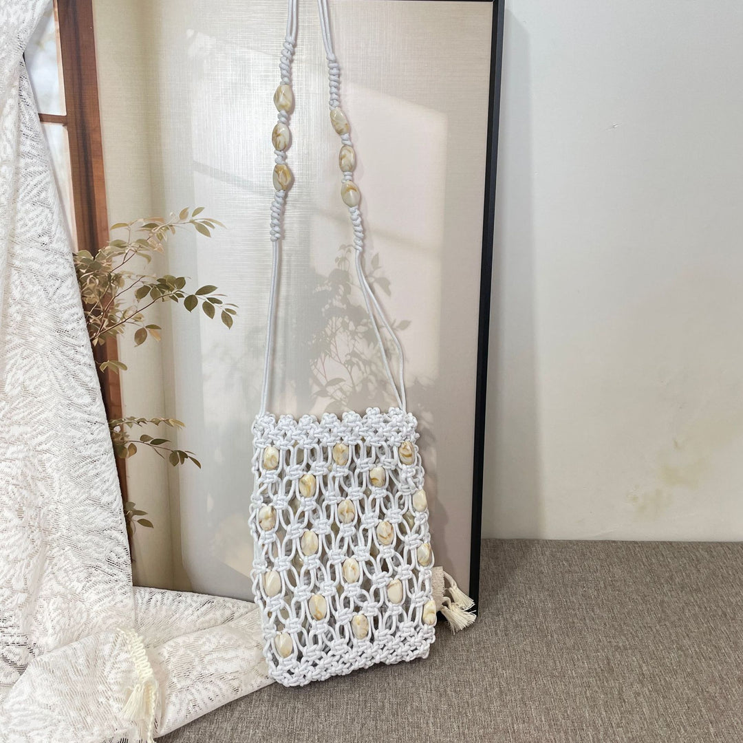 Hand-knotted shoulder bag with shells Stornfield