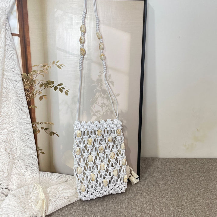 Hand-knotted shoulder bag with shells Stornfield