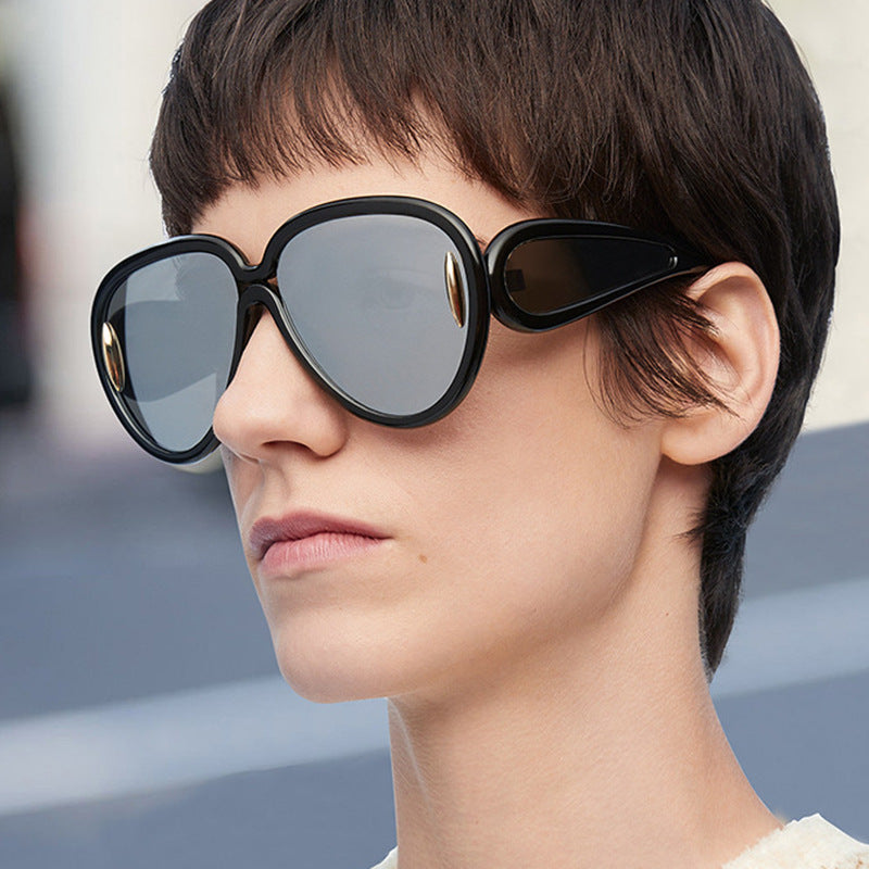Women extravagant sunglasses in creative design Stornfield