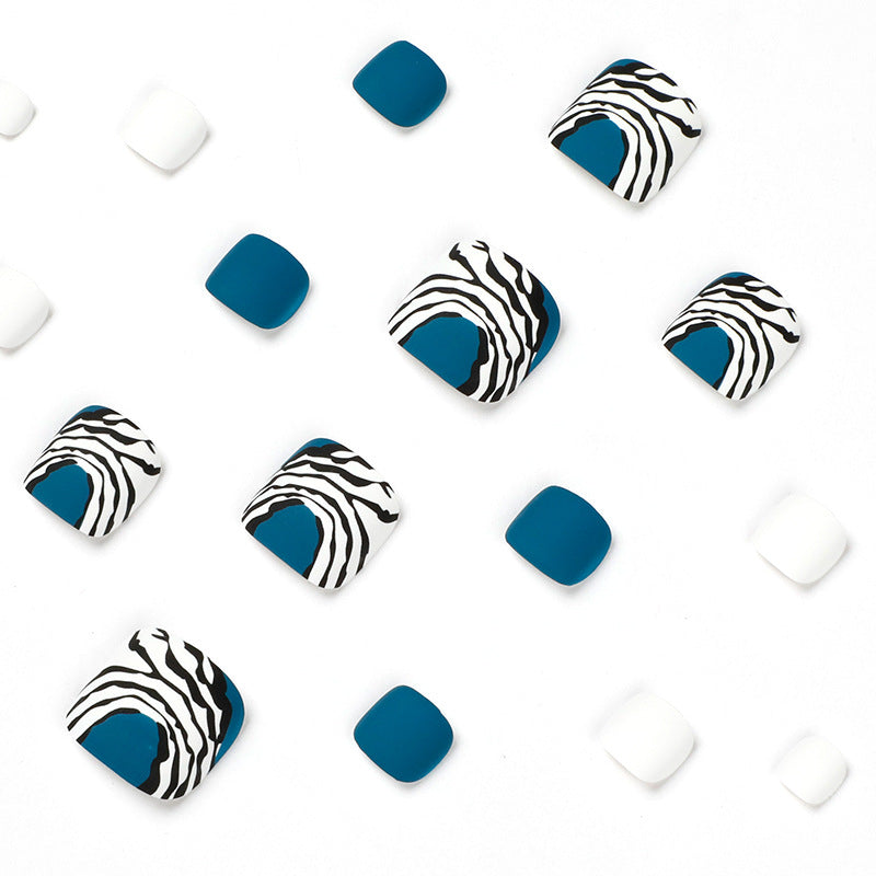 Artful toenail design in modern zebra pattern Stornfield
