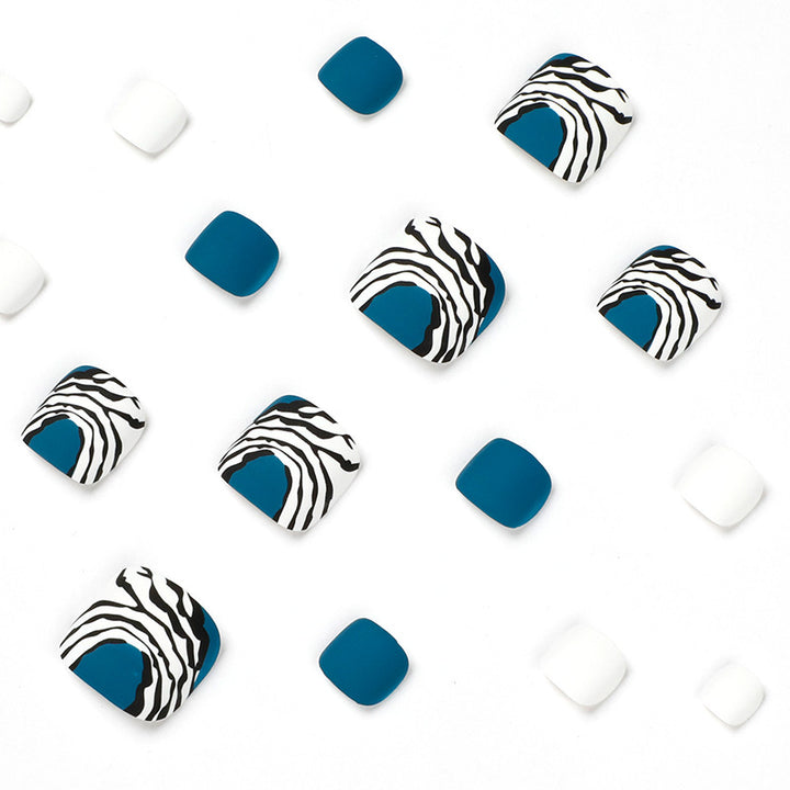 Artful toenail design in modern zebra pattern Stornfield