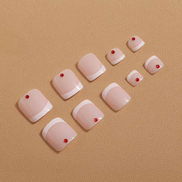 Nail art with creative geometric designs and glitter accents Stornfield