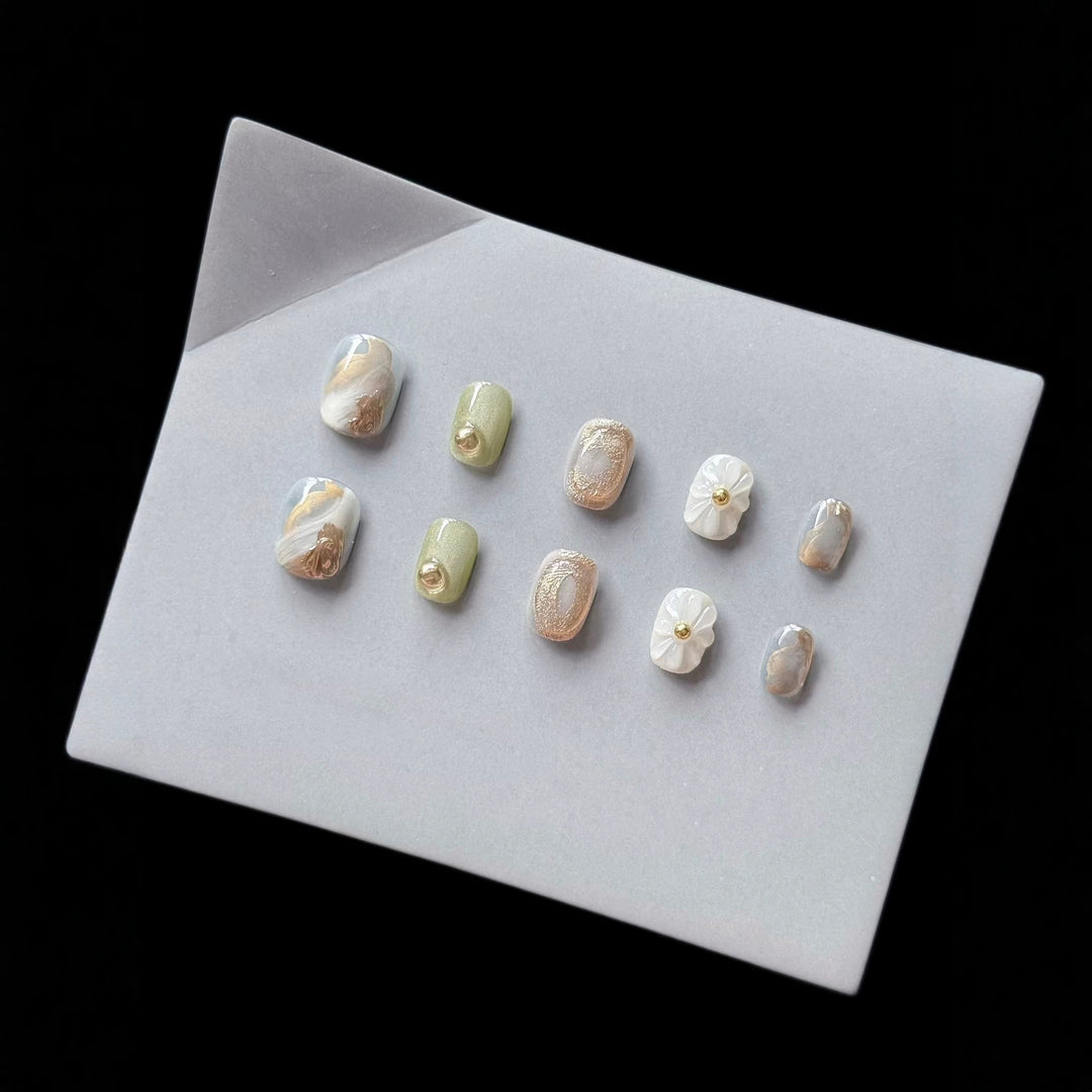 Premium Press-On Nail Art Set with Floral and Metallic Accents