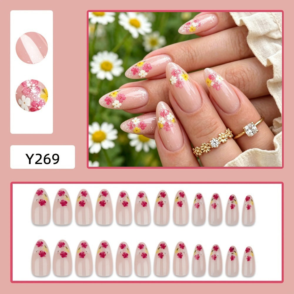 Elegant artificial nails with floral decorations Stornfield