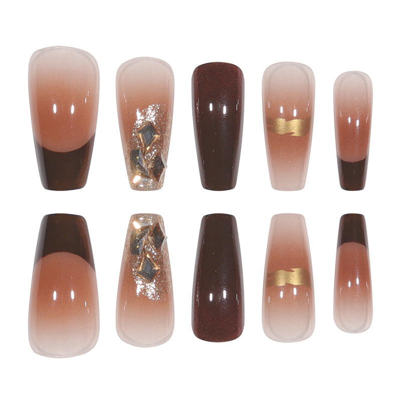 Elegant Long Press-On Nails with Decorative Gold Accents Stornfield