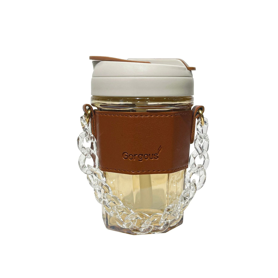 Women drinking cup with elegant leather handle and practical carrying chain Stornfield